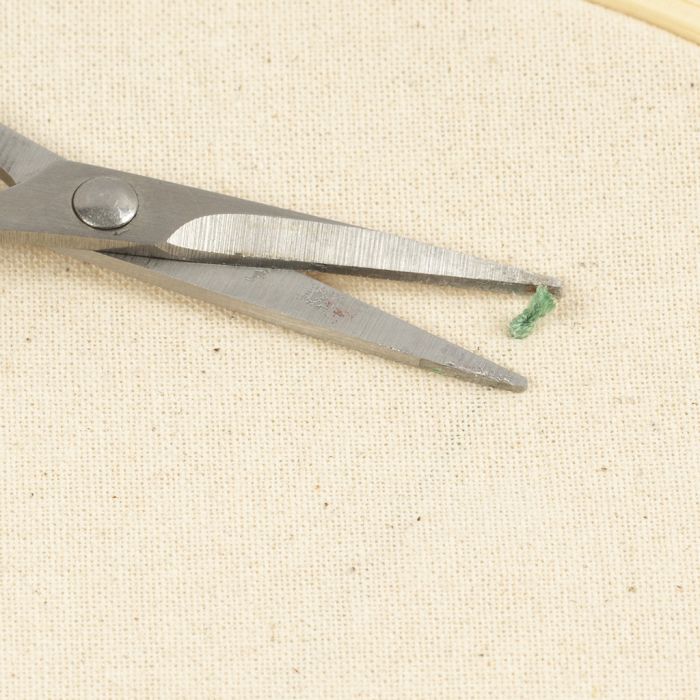 Comment tisser les extrémités lors d'un travail de broderie