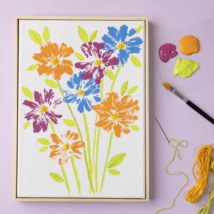 Fleurs sur châssis entoilé