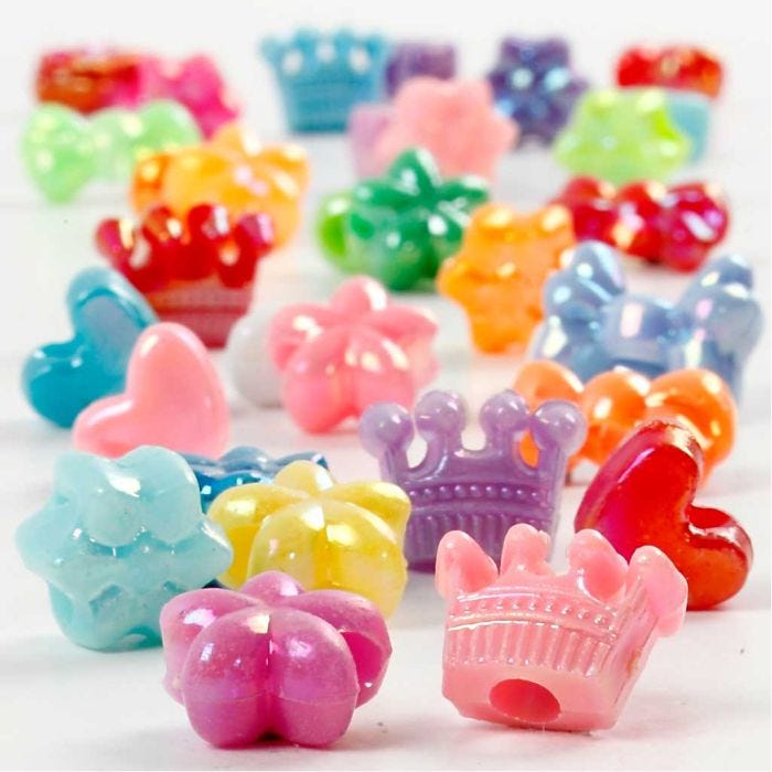 Perles plastique Novelty, d 10 mm, diamètre intérieur 3 mm, 65 gr, 125ml/ 1 Pq.