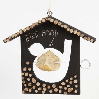 Un mangeoir pour oiseaux en forme de maison