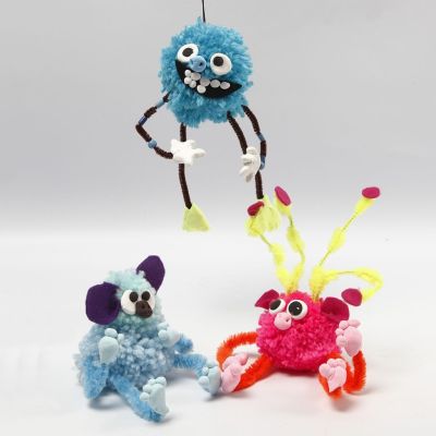 Des animaux fantaisie faits avec des pompons