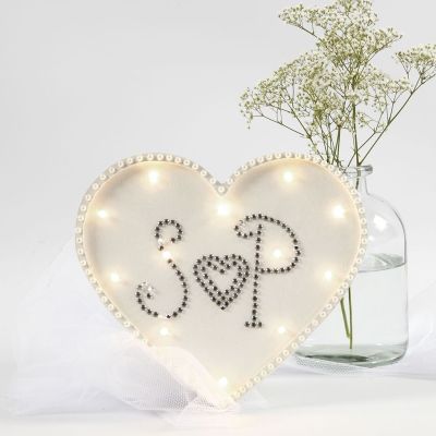 Une boîte lumière en forme de coeur