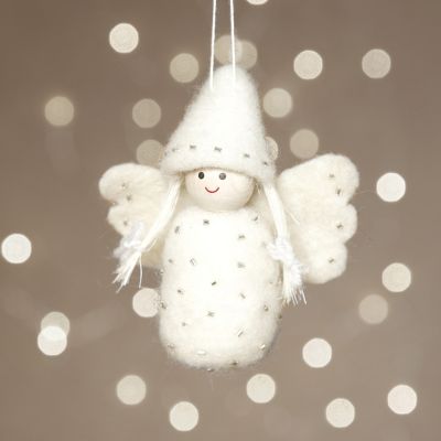 Un ange feutré à l’aiguille sur du polystyrène.