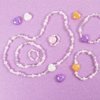 Bijoux en bois et perles de cire