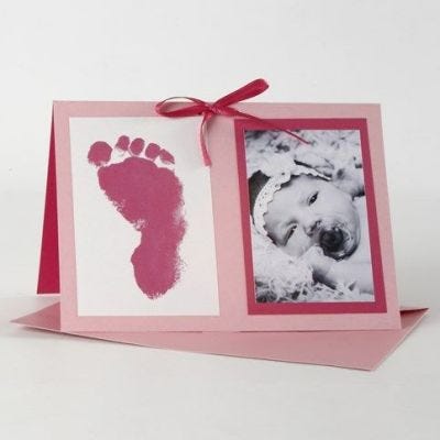 Une invitation pour un Baptême dans des tonalités de roses