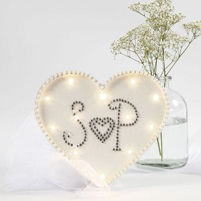 Une boîte lumière en forme de coeur