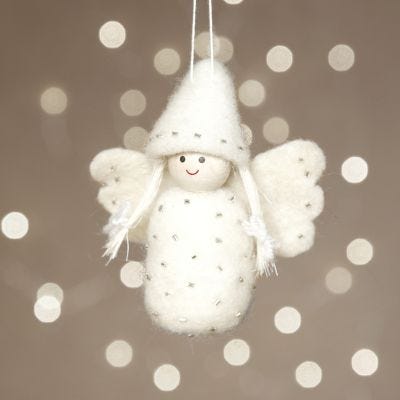 Un ange feutré à l'aiguile sur du polystyrène