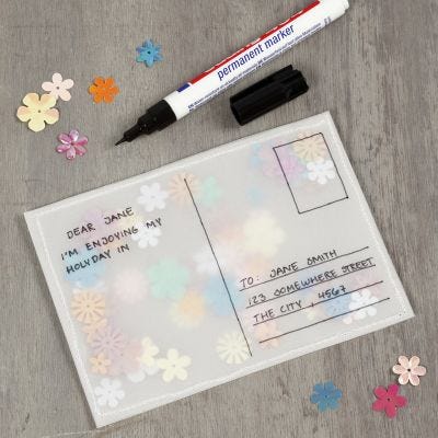 Une carte postale en papier vélin