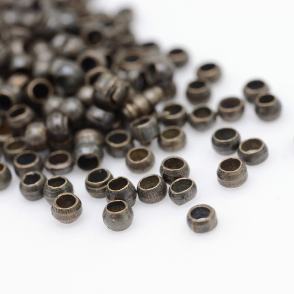 Perles à écraser 2 mm bronze x 100 - Photo n°1