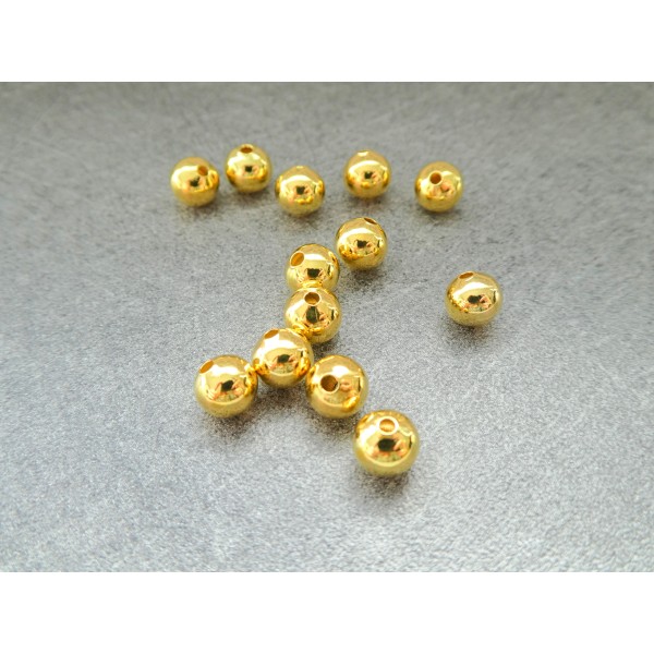 40 Perles rondes 6mm en métal doré - Photo n°1