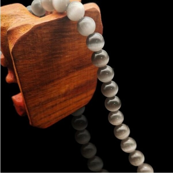 Fil de 63 perles ronde naturelle 6 mm OEIL DE CHAT GRIS - Photo n°1