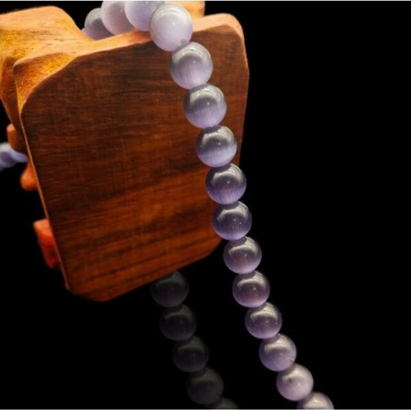 Fil de 63 perles ronde naturelle 6 mm OEIL DE CHAT MAUVE FONCE - Photo n°1