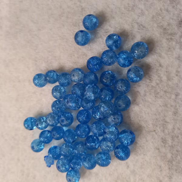 Cinquante, 50  perles bleu foncées transparente craquelées 0.8 cm - Photo n°1