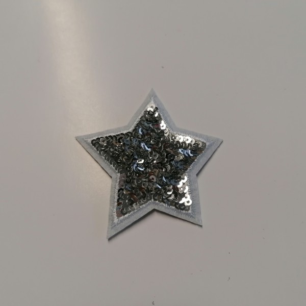 Un thermocollant étoile grise - Photo n°1