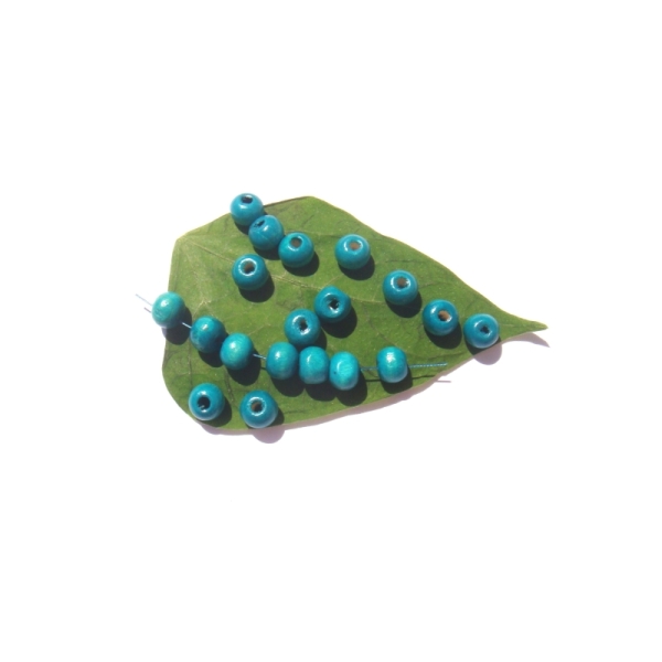 Lot 20 Perles Bois teinté Turquoise délavé 8 MM de diamètre - Photo n°1