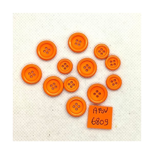 12 Boutons en résine orange - 14mm et 11mm - ABV6809 - Photo n°1