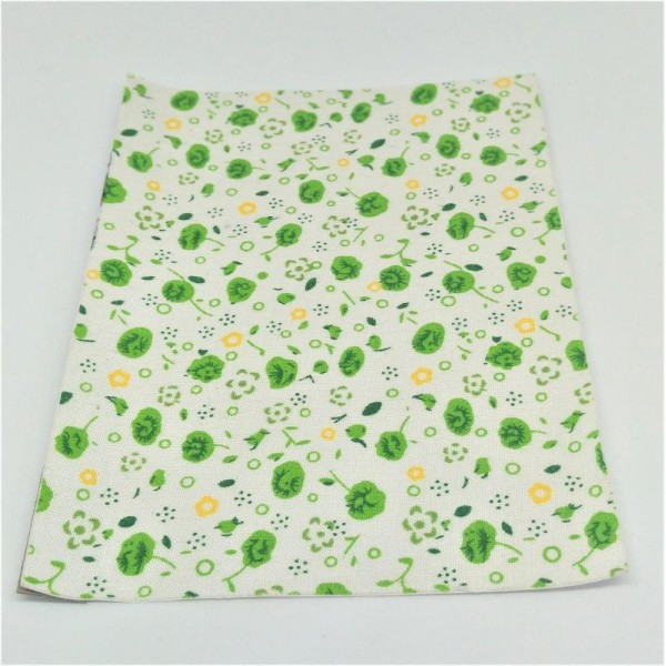 Tissu autocollant motifs fleurs variées 10x15cm vert et jaune fond blanc - Photo n°1