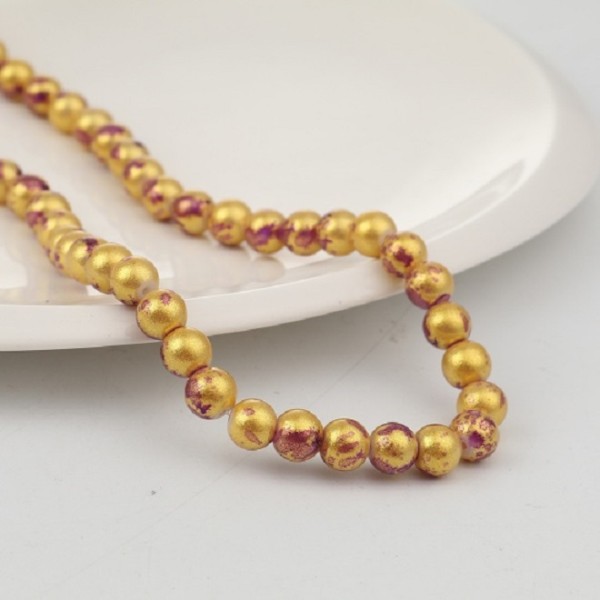 Perles en verre 8 mm doré et mauve x 10 - Photo n°1