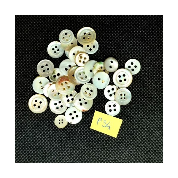 34 Boutons en nacre blanc cassé - entre 13mm et 8mm - P34 - Photo n°1