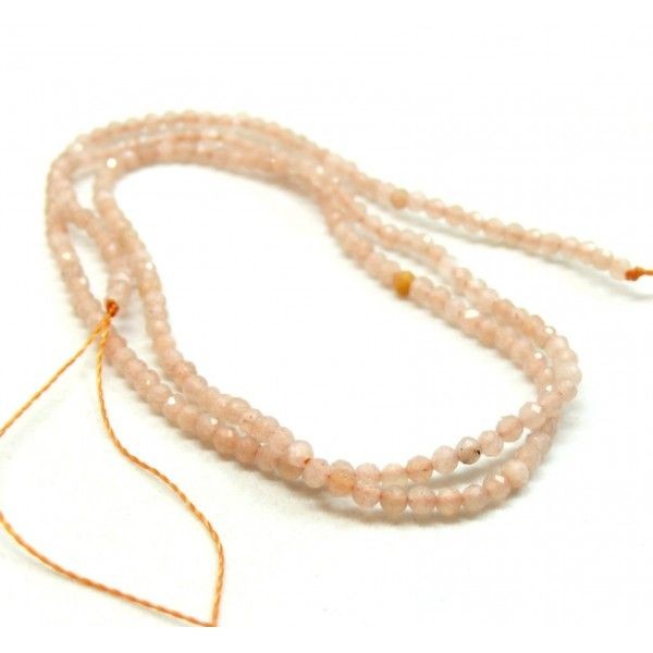 PS11722178 Lot d'un fil de 19cm de perles facettées de Pierre du soleil 2mm couleur pêche - Photo n°1