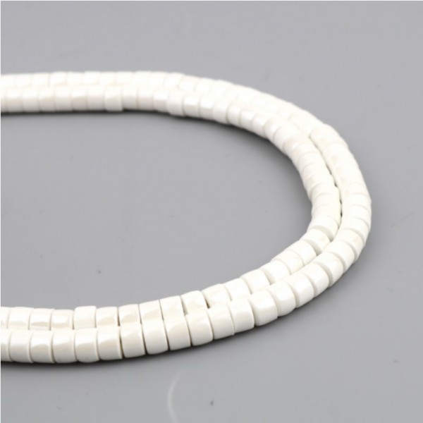 PS11707435 PAX de 40 Perles Intercalaires Rondelles Heishi Céramique 6 par 4mm - Photo n°1
