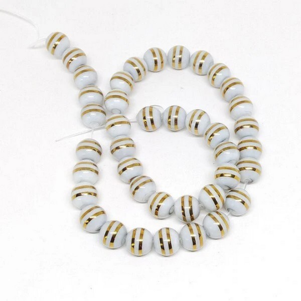 10 perles ronde en verre 8 x 7.5 mm fabrication bijoux RAYEES BRILLANT DORE - Photo n°1