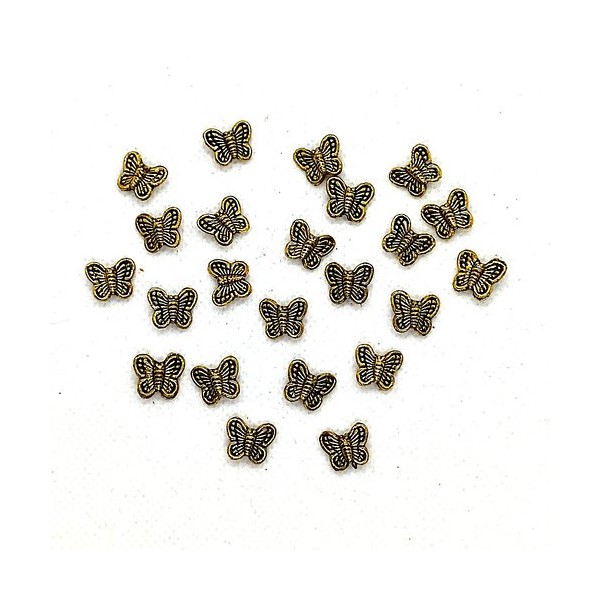 23 Perles en métal doré - papillon - 9x11mm - Photo n°1