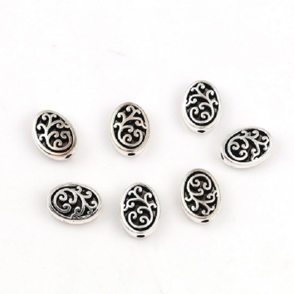 Perles métal ovale à motifs argent mat x 10 - Photo n°1