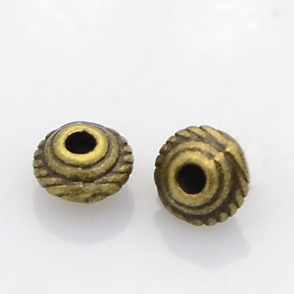 Perles métal intercalaire toupie strié 5 mm bronze x 50 - Photo n°2