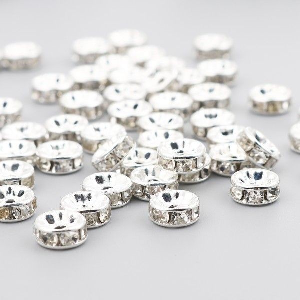 PS110255974 PAX 25 perles intercalaires Rondelles Ethnique 4 mm, métal  finition Argent VIF - Photo n°1