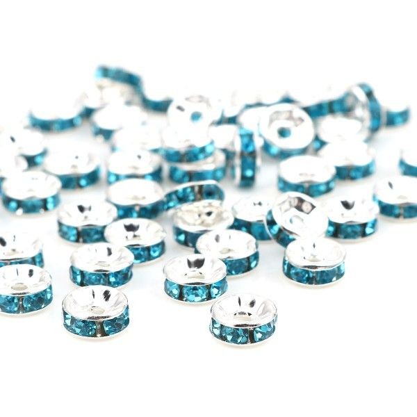 PS110255977 PAX 25 Perles intercalaires Rondelles avec Strass 4 mm, métal  finition Bleu Turquoise - Photo n°1