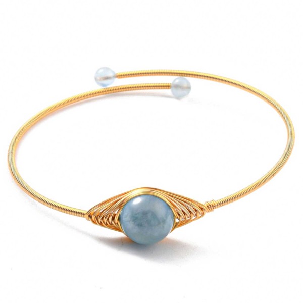 Bracelet manchette doré avec perles d'aigue-marine. - Photo n°1