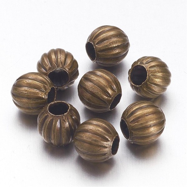 Perles métal intercalaires 6 mm bronze x 20 - Photo n°1