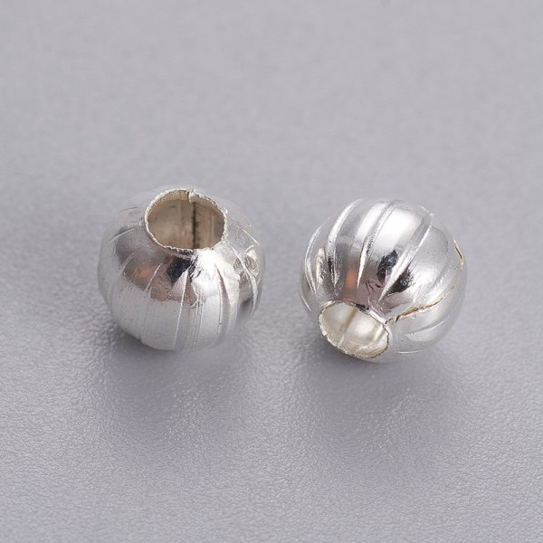 Perles métal intercalaires 5.5 mm argent mat x 20 - Photo n°1