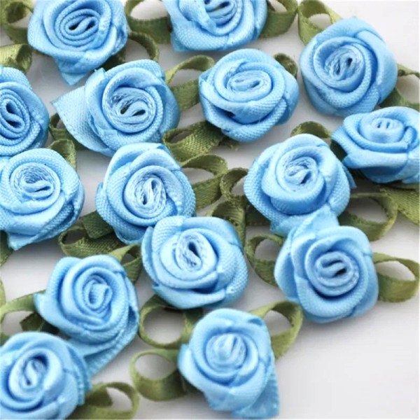LOT 6 APPLIQUES TISSUS : rose couleur bleu 15mm - Photo n°1