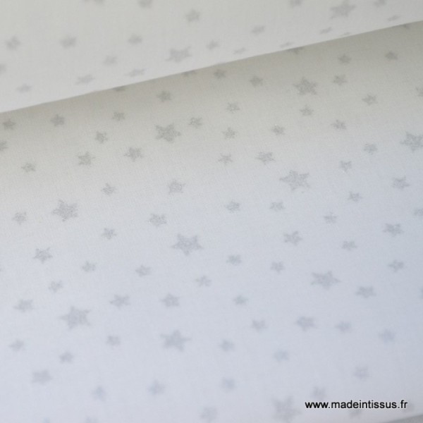 Tissu coton imprimé dessin étoiles argentées sur fond blanc - Photo n°1
