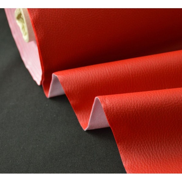 Tissu Simili cuir ameublement rigide rouge .x1m - Photo n°1