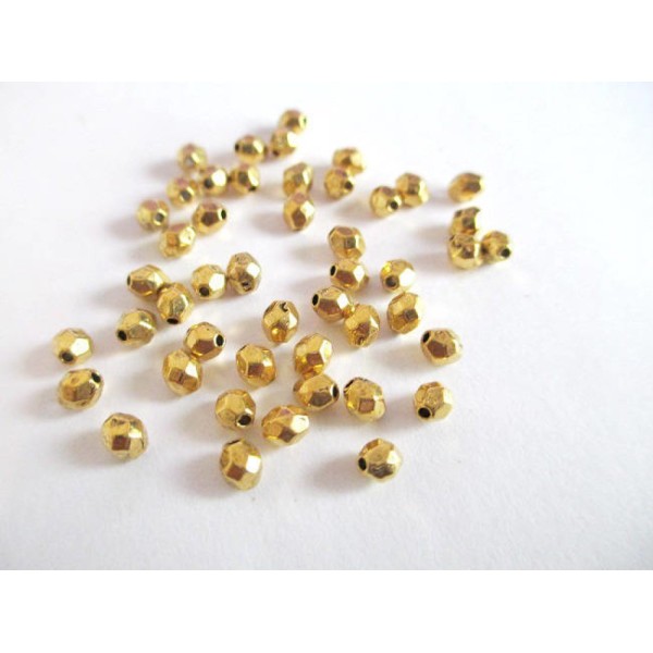 25 Perles intercalaire a facettes en métal couleur doré 4x3.5mm (app7) - Photo n°1