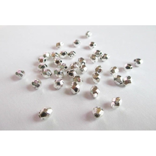 25 Perles intercalaire a facettes en métal couleur argent 4x3.5mm (app6) - Photo n°1