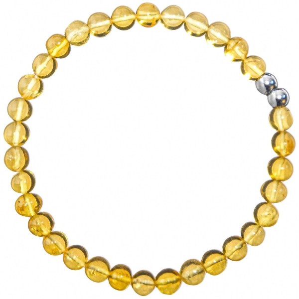 Bracelet en ambre miel - Perles rondes 5 mm. - Photo n°1