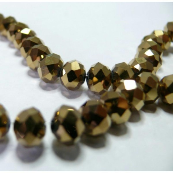 10 Perles de cristal facetté bronze doré 5 par 8mm ref - Photo n°1