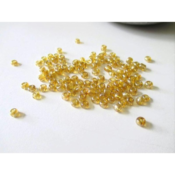 Lot de 30 gr de perle de rocaille ambre doré 3 mm - Photo n°1