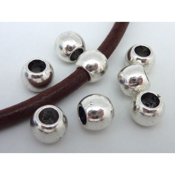 10 Perles Légèrement Ovale En Métal Argenté Pour Cordon 4,5mm - Photo n°1