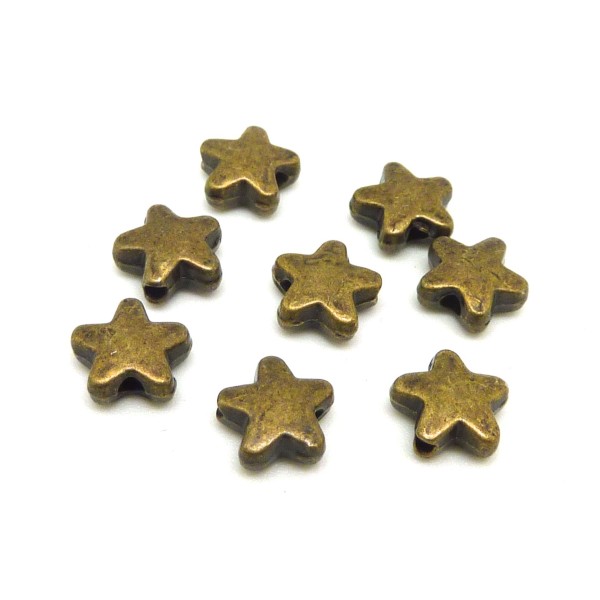 20 Petites Perles Étoiles 7,1mm En Métal De Couleur Bronze - Photo n°1