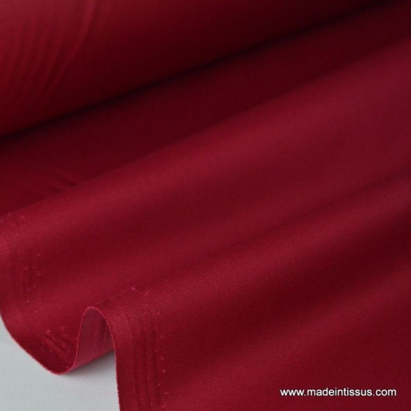 Tissu Gabardine enduite étanche rouge hermès. - Photo n°1