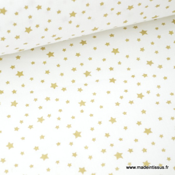 Tissu coton imprimé dessin étoiles vieil or sur fond blanc . x1m - Photo n°1