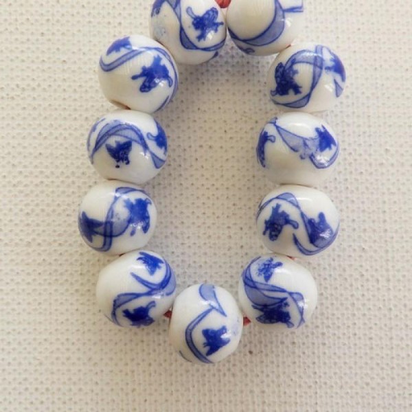 10 perles céramique porcelaine rondes 1,2 cm PETIT PAPILLON BLEU - Photo n°1