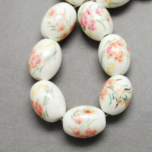 15 perles ovales porcelaine ceramique 1.05 x 0.8 cm FLEUR ROSE - Photo n°1