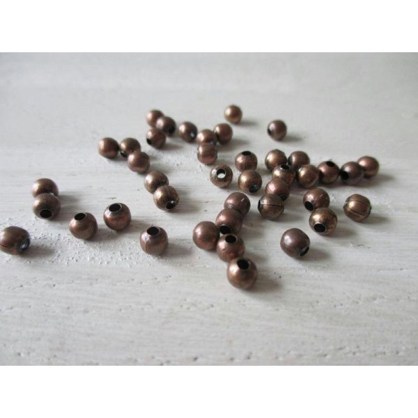 Lot de 40 perles métal ronde cuivre rouge 4 mm - Photo n°1