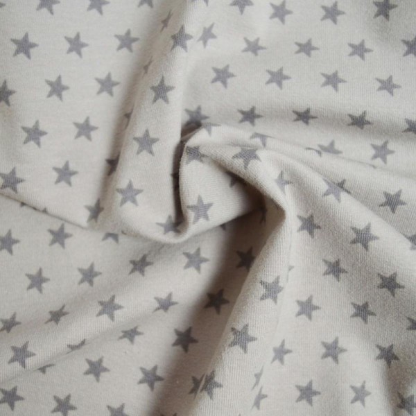 Tissu jersey coton-élasthanne beige imprimé étoiles taupes (par multiple de 20cm) - Photo n°2